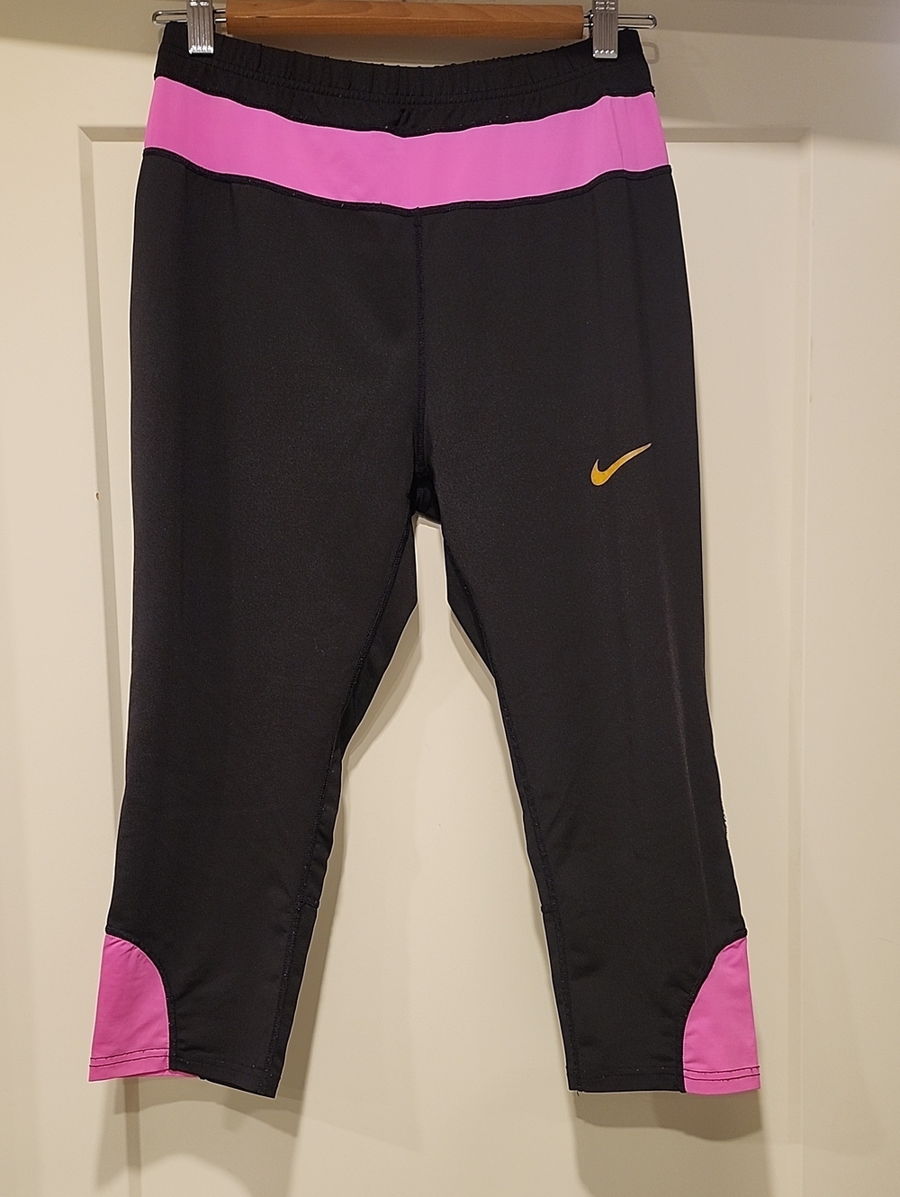 Nike Black Leggings with Pink Trim and Gold Swoosh - Womens Capri